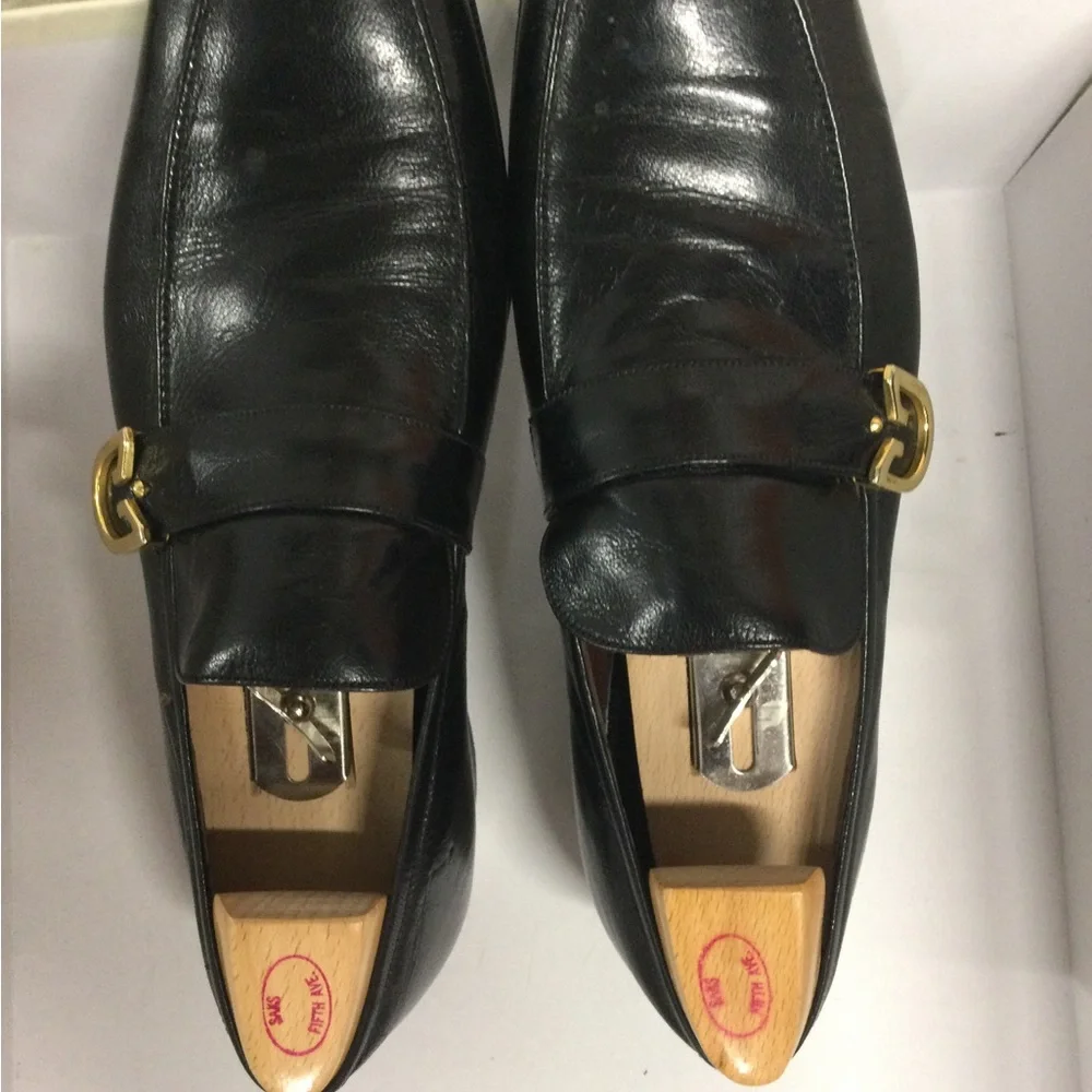Classic Black Leather Slip-On Loafers with Gold Hardware